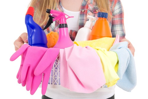 Deep upholstery cleaning equipment in use on a couch