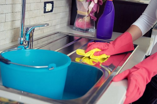 Disinfecting high-touch areas in a commercial facility