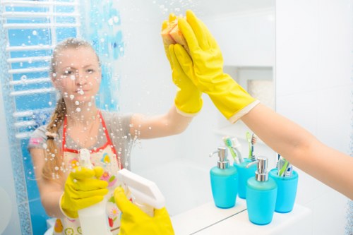 Professional domestic cleaning in a tidy bedroom